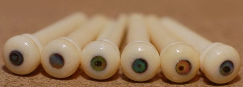 Bone guitar pins with abalone dot inlays